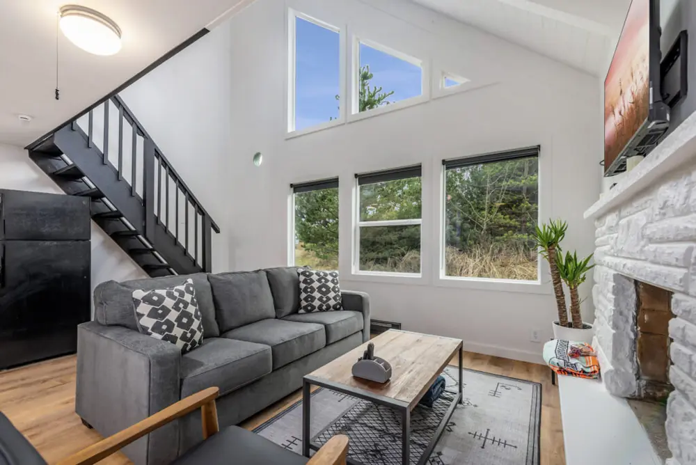 Bright living room inside a Tidal House chalet