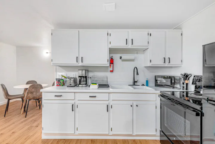 Kitchen inside a Tidal House A-frame cottage