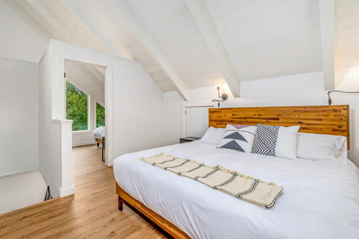 Upstairs bedroom inside a two-bedroom Tidal House cottage